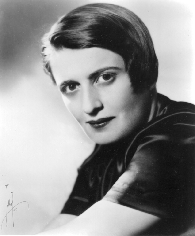 A black and white photograph of Ayn Rand, a Russian-American writer and philosopher known for her contributions to Objectivism.